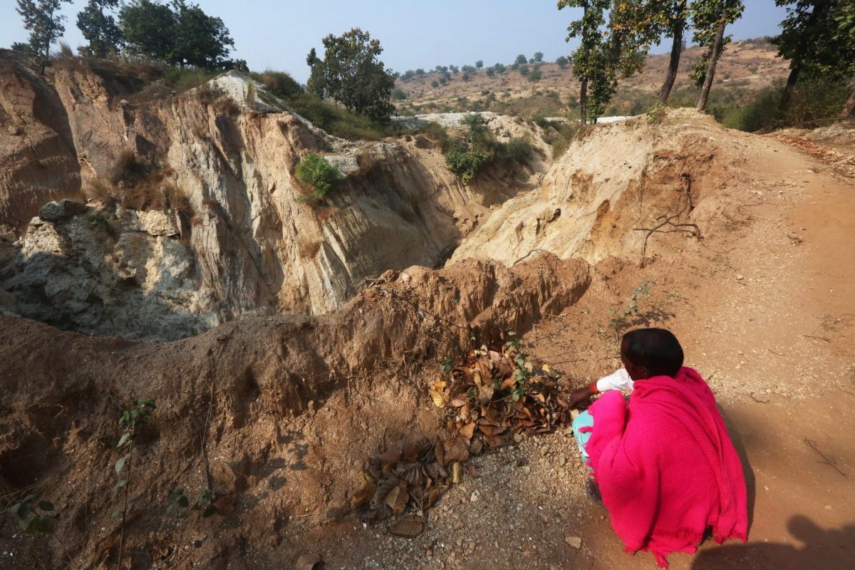 A laborer sits at the periphery of the abandoned mica mine in Bergiyatari, Giridih | Photo: Praveen Jain | ThePrint