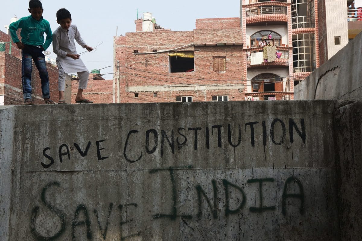 On the walls opposite to the Mustafabad's Farooqia Masjid have written messages like this | Photo: Manisha Mondal | ThePrint