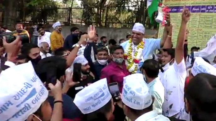 Aam Aadmi Party workers celebrate the party's victory in the Surat Municipal Corporation elections in Surat, Gujarat, on 23 February 2021 | ANI