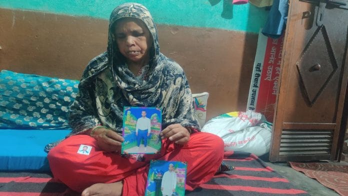 Kismatun, 61, with photos of Faizan at the family's home in Delhi | Bismee Taskin | ThePrint