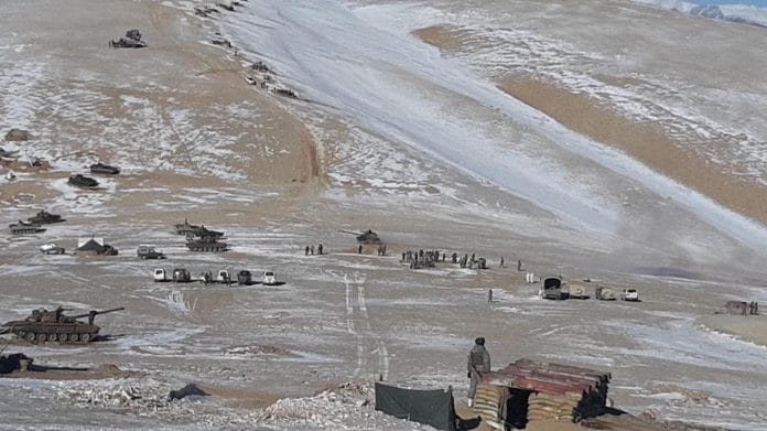 Representational image | File photo of Chinese PLA troops dismantling temporary structures erected near Pangong Tso and marching back | Pic courtesy: Indian Army