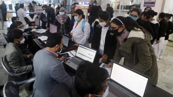 Beneficiaries stand in queues at a vaccination centre at Eraz Medical College, in Lucknow (representational image) | ANI