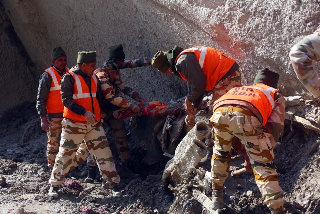 Security forces find more belongings — a blood-stained cloth and a blanket — at the Rishi Ganga 