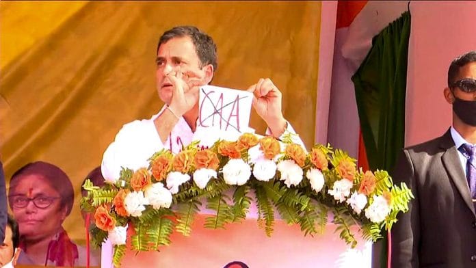 Congress leader Rahul Gandhi with a ‘No CAA’ sign at the rally in Assam’s Sivasagar last Sunday | Twitter/Gaurav Gogoi