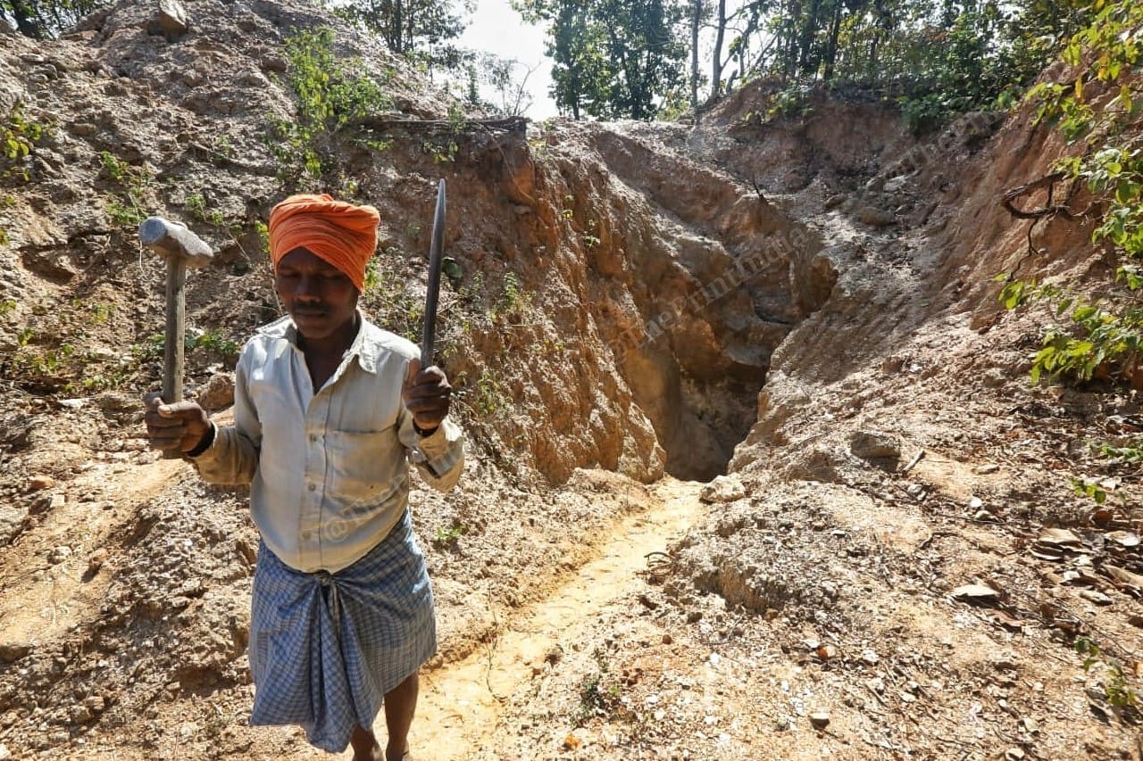 Tulsi Rai displays the tools used by laborers to dig for mica | Photo: Pravin Jain/ThePrint