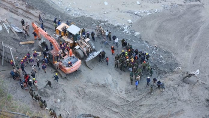 Rescue operations continue at Tapovan Tunnel after a glacier burst in Joshimath which caused a massive flood in the Dhauli Ganga river in Uttarakhand's Chamoli district | ThePrint | Suraj Singh Bisht
