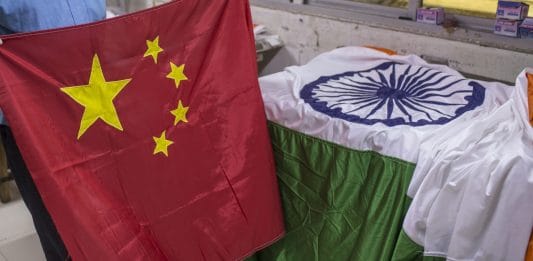 An Indian and Chinese flags at FlagSource workshop in Mumbai | Photo: Dhiraj Singh | Bloomberg