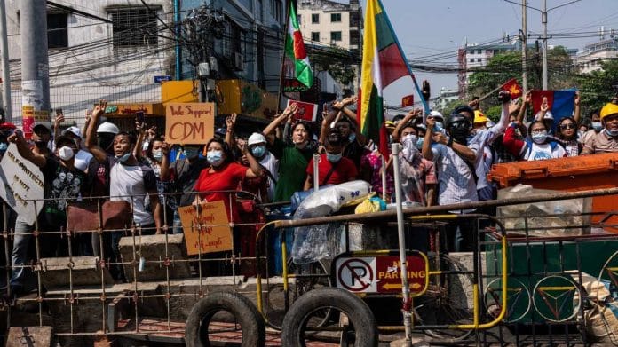 File photo of an anti-coup protest in Yangon, Myanmar, in February 2021 | Bloomberg