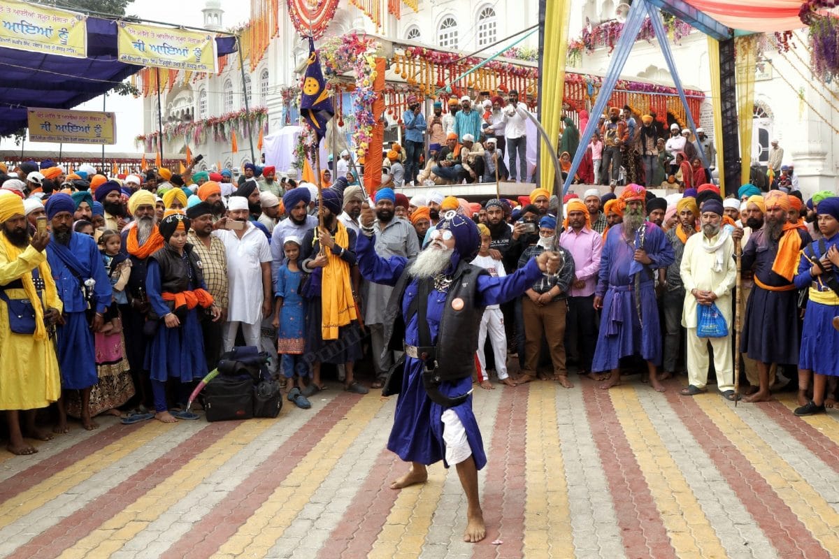  Nihangs, the armed sect of Sikihism, showcased tricks outside the Takhat Sri Kesgarh Sahab gurudwara | Photo: Manisha Mondal | ThePrint