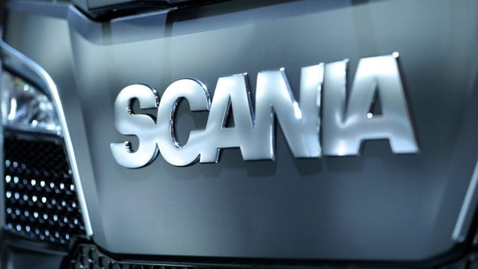 A Scania AB logo sits on a Scania L320 PHEV plug-in hybrid haulage truck cabin at the IAA Commercial Vehicles Show | Krisztian Bocsi | Bloomberg