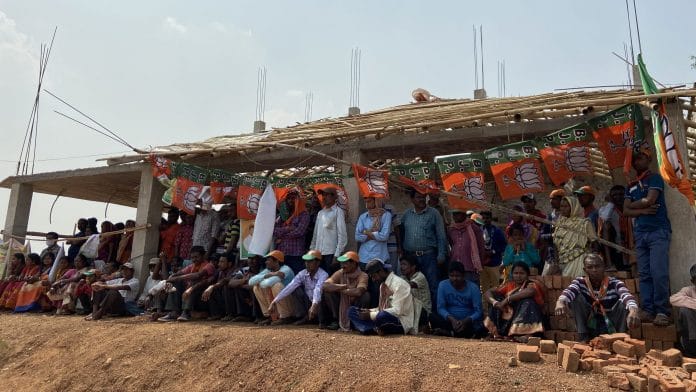 BJP supporters wait for Union Minister Arjun Munda’s election rally at Belpahari in Jangalmahal | Photo: Madhuparna Das/ThePrint