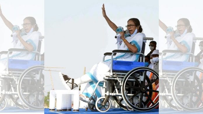 West Bengal CM Mamata Banerjee addresses an election rally from a wheelchair ahead of the state assembly election, in Balrampur on 15 March 2021 | ANI