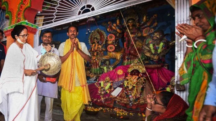 West Bengal CM Mamata Banerjee visits a temple, during an election campaign ahead of state assembly polls, in Nandigram, on 9 March 2021 | PTI