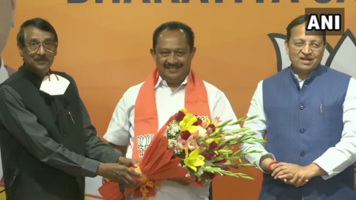 Former Kerala Pradesh Congress Committee secretary Vijayan Thomas joins BJP in Delhi, on 12 March 2021 | Twitter | @ANI