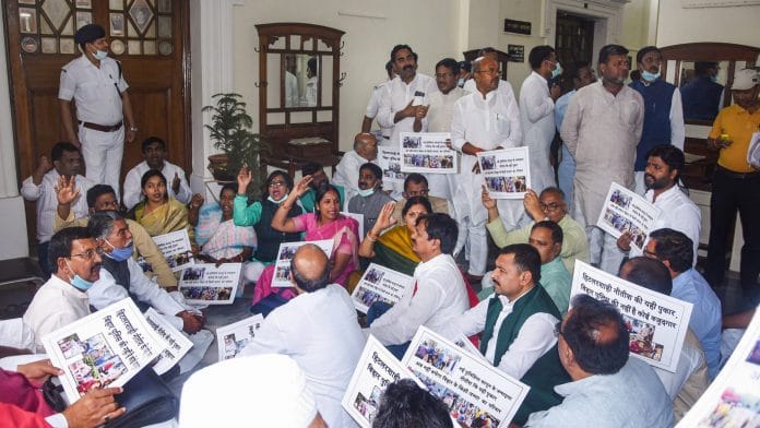 Patna: RJD legislators stage a dharna outside Speaker Vijay Kumar Singh's chamber during Budget Session of Bihar assembly, in Patna, Tuesday, March 23, 2021. | PTI