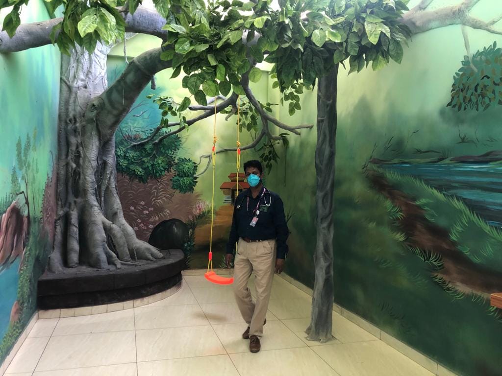 Hospital superintendent Dr Shahirsha stands in the play area of the new government hospital in Punalur taluka, built with KIIFB funds. | Photo: Jyoti Malhotra/ThePrint