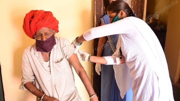 A resident of Jalindri getting the second dose of Covishield at a vaccination centre. | Photo: Rohit Jain Paras/ThePrint