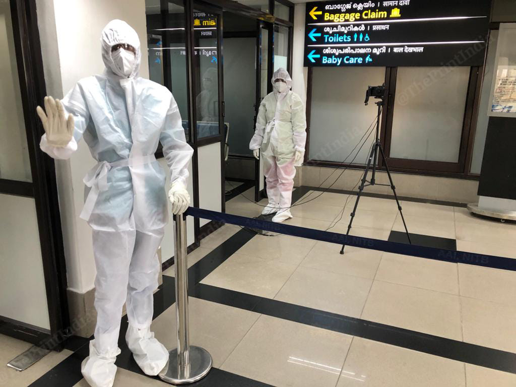 Kerala's health workers in PPE suits welcome you when you land in Thiruvananthapuram airport | Photo: Jyoti Malhotra | ThePrint