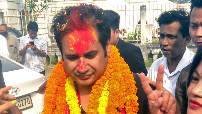 Pradyot Kishore Manikya Debbarma flashes the victory sign after his new party TIPRA Motha won the Tripura Tribal Areas Autonomous District Council elections Saturday | Photo: ANI