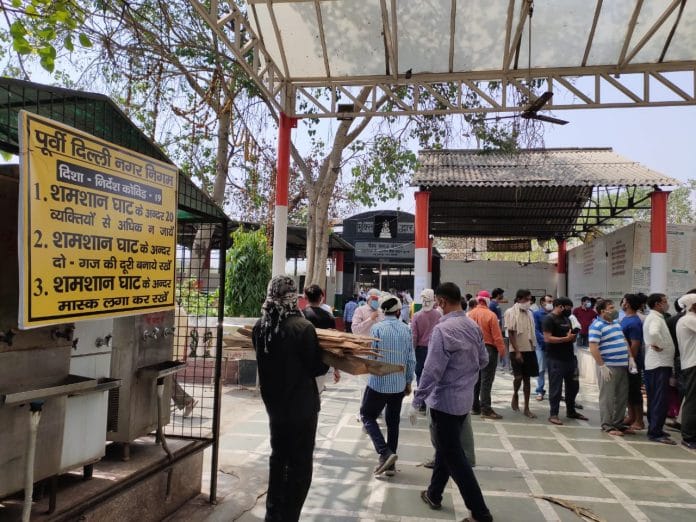 A poster at Ghazipur crematorium that says more than 20 people shouldn't be in the premises. | Photo: Simrin Sirur/ThePrint