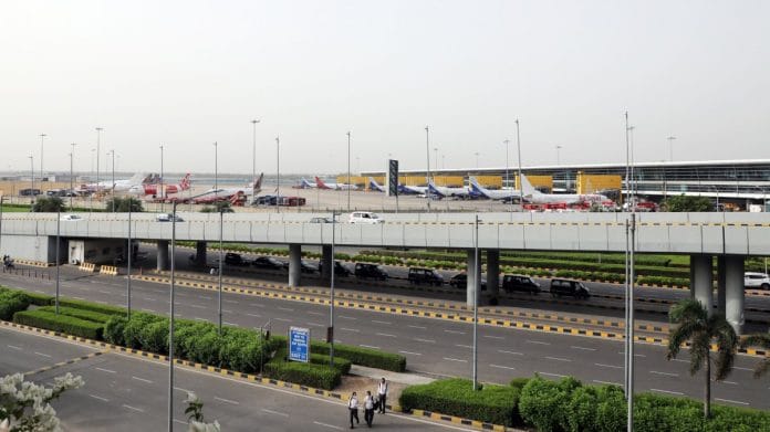 Aircraft stand at Terminal 3 of Indira Gandhi International Airport in New Delhi | Photographer: T. Narayan | Bloomberg