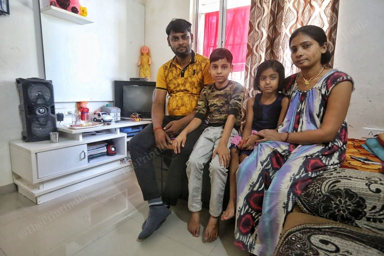 Abhay Singh and his family in their apartment in the GIFT City. | Photo: Praveen Jain/ThePrint