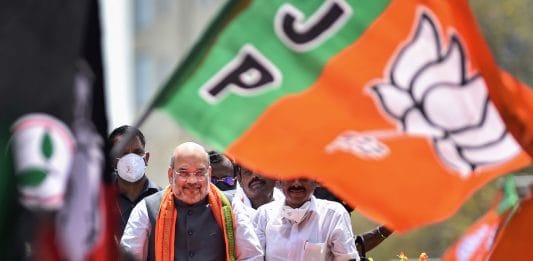 BJP's Amit Shah during a roadshow at Thyagaraya Nagar, in Chennai on 3 April | PTI Photo