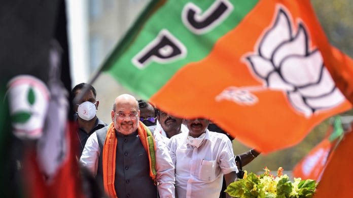 BJP's Amit Shah during a roadshow at Thyagaraya Nagar, in Chennai on 3 April | PTI Photo