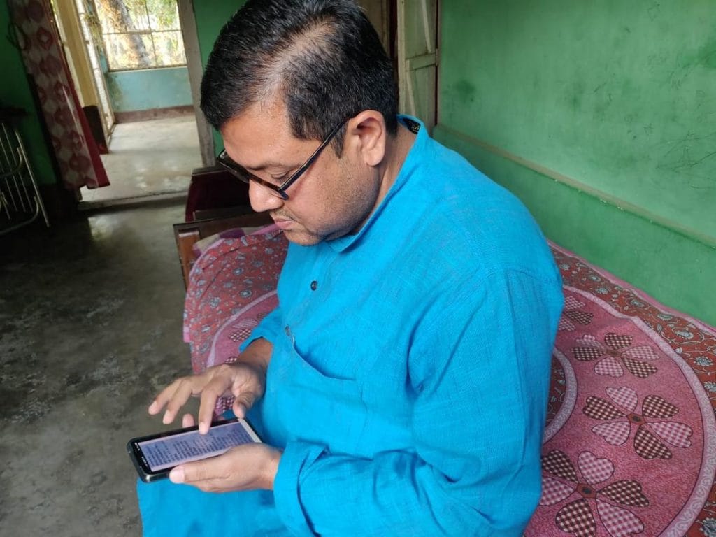 Farhad Bhuyan reads out one of his poems | Photo: Fatima Khan | ThePrint