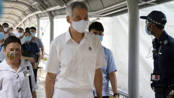 Singapore's Prime Minister Lee Hsien Loong departs a nomination center, on June 2020 | Photographer: Wei Leng Tay | Bloomberg