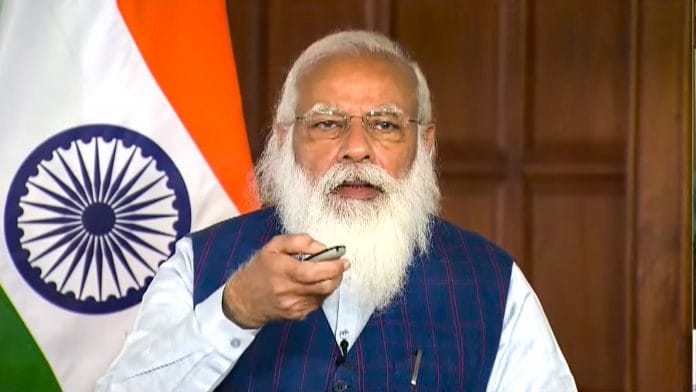 Prime Minister Narendra Modi speaks during the Association of Indian Universities' 95th annual meet and National Seminar of Vice-Chancellors, via video conferencing, on 14 April 2021 | PTI Photo