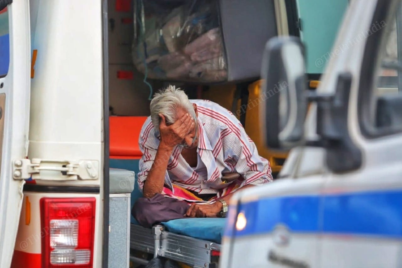 An old man sits with hand on his forehead | Photo: Praveen Jain | ThePrint