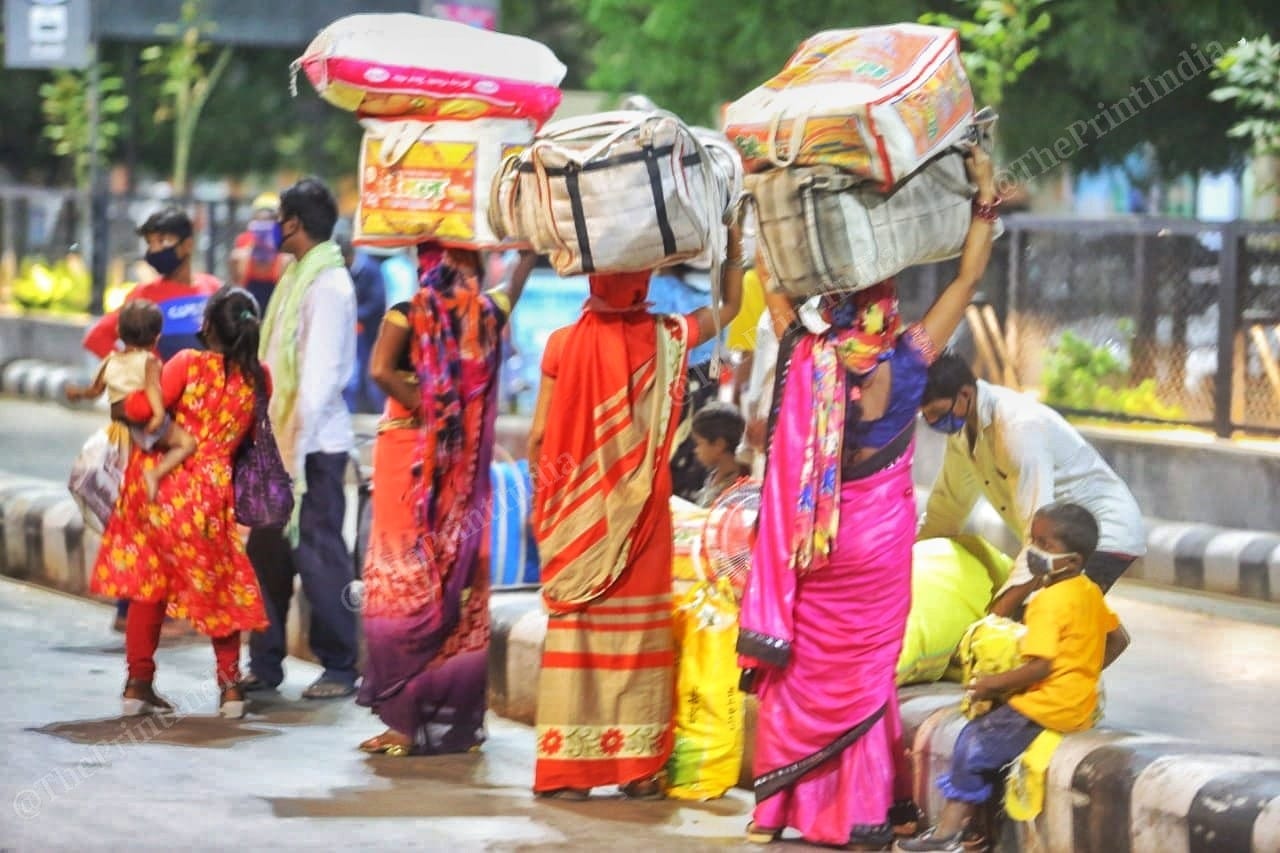 A family of migrant workers walk towards the railway station | Photo: Praveen Jain | ThePrint