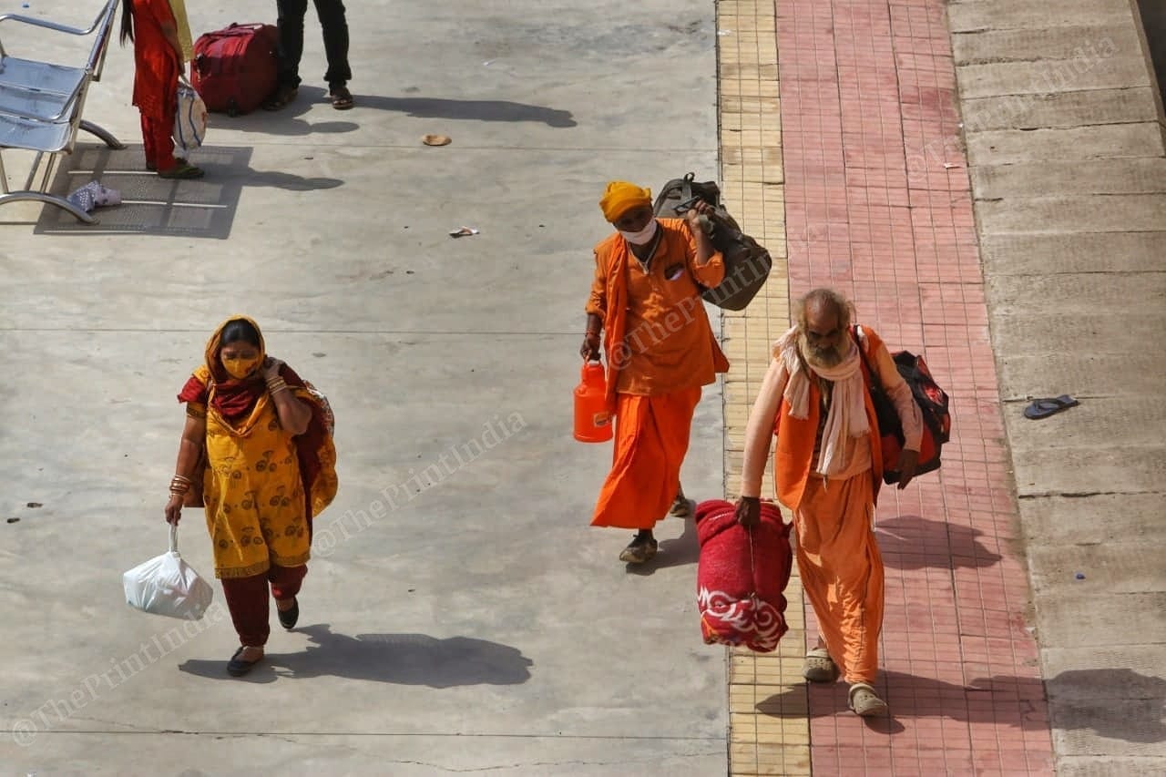 People returning from Kumbh at the Sabarmati Railway Station in Ahmedabad Sunday | Praveen Jain | ThePrint