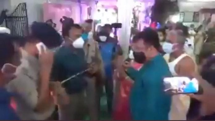 West Tripura District Magistrate Shailesh Kumar Yadav (third from left) stops the wedding in Agartala | Screengrab