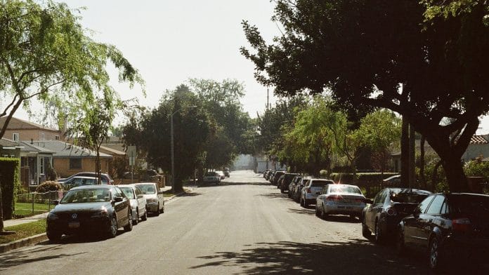 A neighbourhood lines with trees
