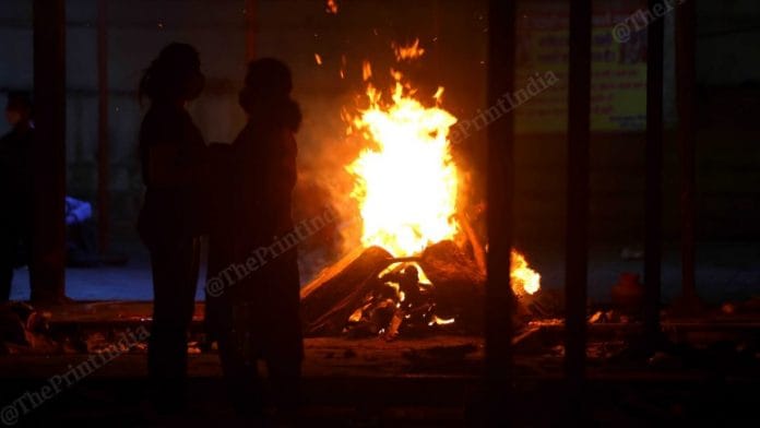 Nigambodh Ghat in Delhi, which has been a designated crematorium for Covid victims, saw a sudden rise in the number of bodies after the second wave of the pandemic hit the country and capital Delhi. Grieving relatives had to stand in queues for interminable hours as the cremation ground became a sea of burning pyres and its electric burners billowed out spirals of smoke.