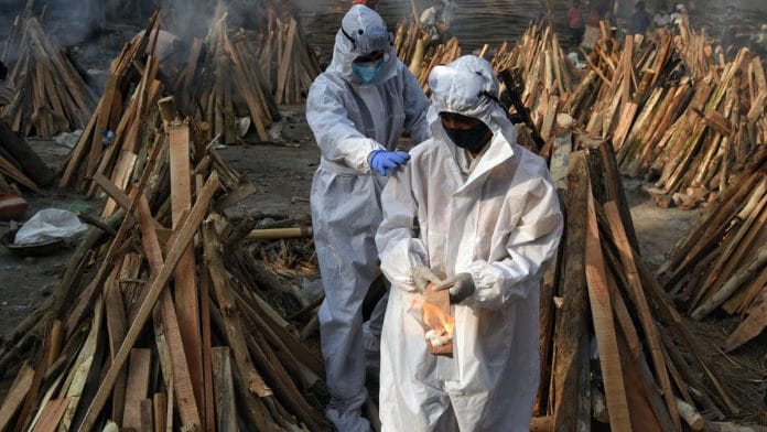 Representational image of a mass Covid-19 funeral at a crematorium | Photo: ANI