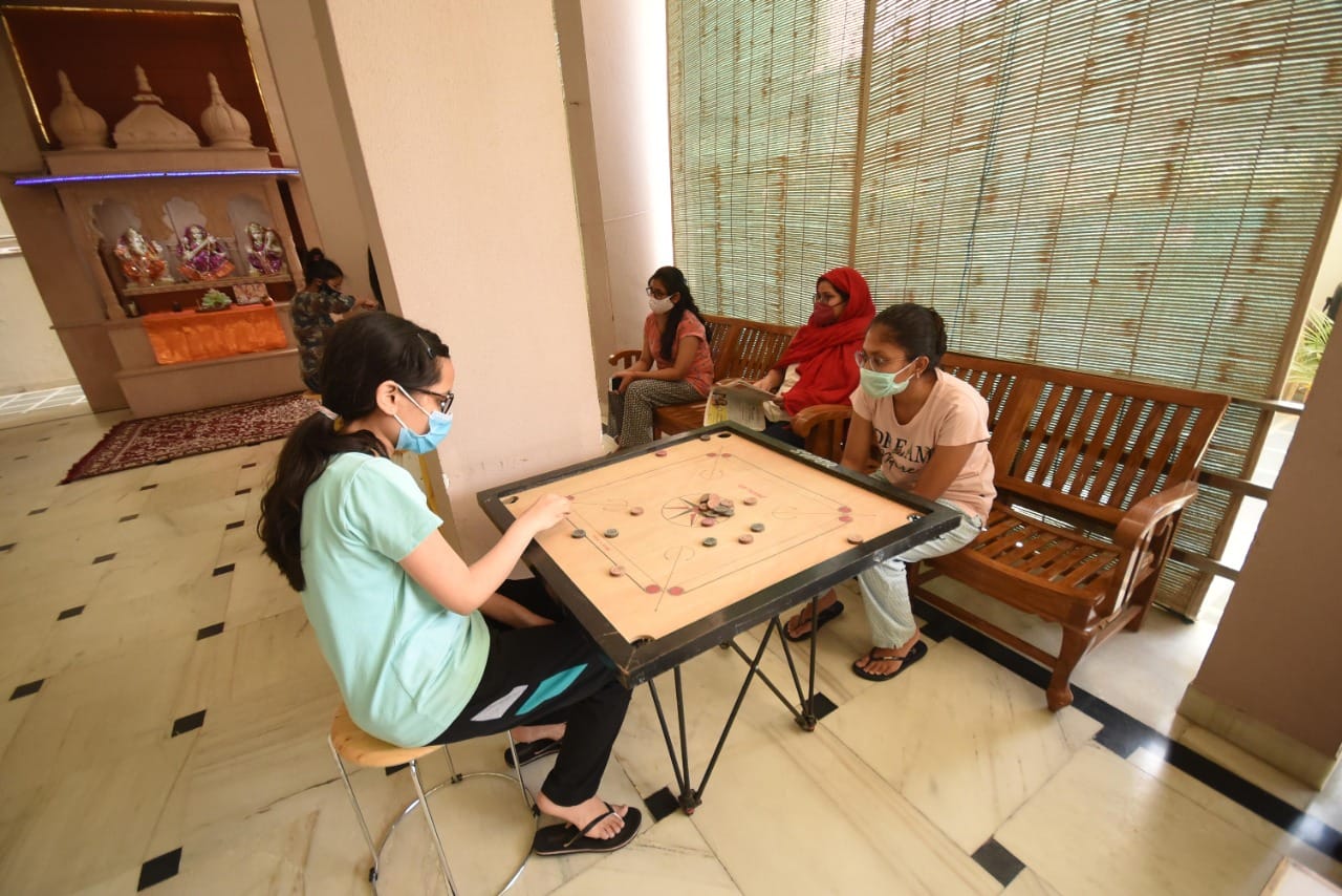 Students at a girls’ hostel in Kota who continue to stay put even as most of their fellow classmates have left for their hometowns amid the surge in cases in the district. The girls are seen playing a game of carrom during their break time. | Photo: Rohit Jain Paras/ThePrint