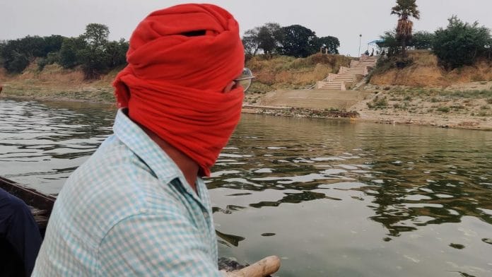 Amit Sah, a resident of Gahmar village in Ghazipur district of Uttar Pradesh, accompanies ThePrint on a motorboat journey on the Ganga Thursday | Photo: Sajid Ali | ThePrint