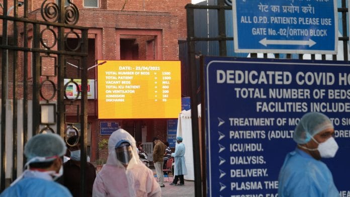 A board indicates available beds at the Lok Nayak Jaiprakash Hospital in New Delhi, on 25 April 2021 | Bloomberg