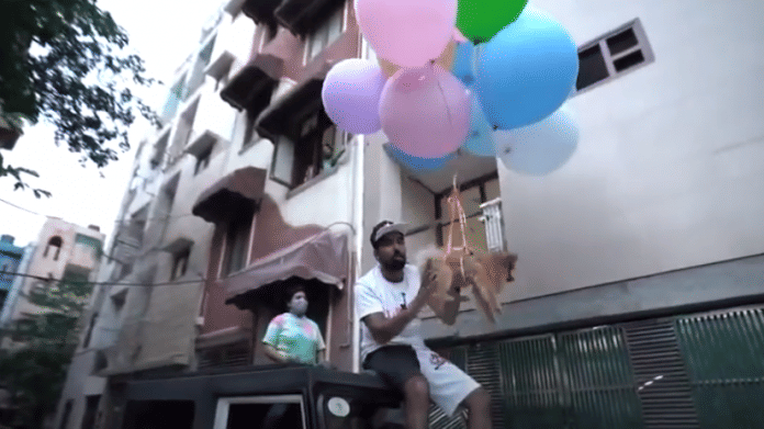 YouTuber Gaurav Sharma seen with a dog tied to balloons