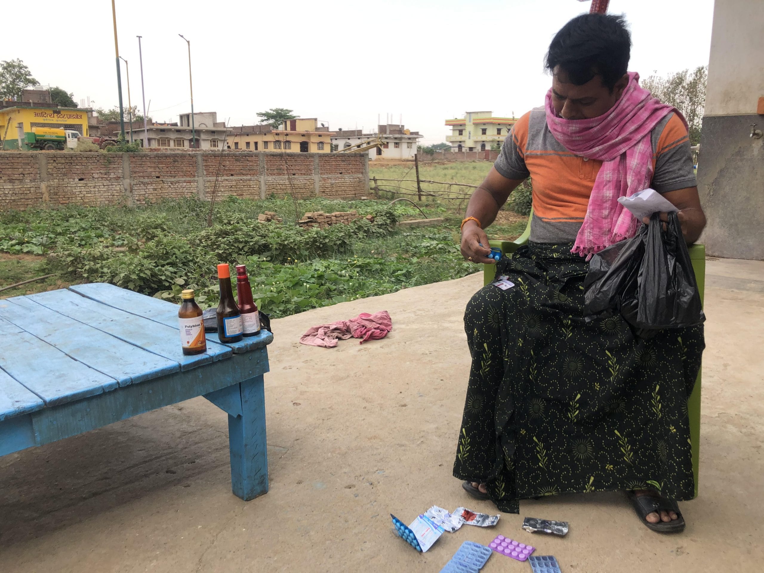 Village head Surender Yadav sorts through his medicines | Jyoti Yadav | ThePrint