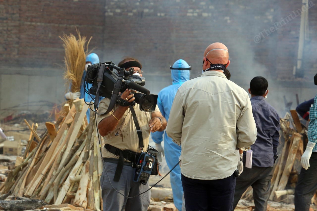 Foreign media at the Seemapuri cremation ground in New Delhi | Praveen Jain | ThePrint