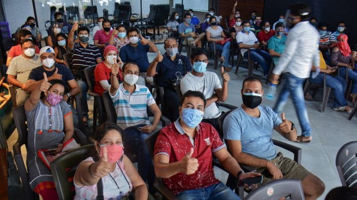 Crowd waits at the vaccination center to receive the Covid-19 dose amid the pandemic in Thane, on 1 May 2021 | PTI