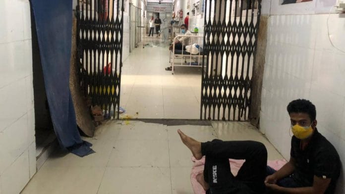 Family members wait outside the Covid ward at NMCH | Jyoti Yadav | ThePrint