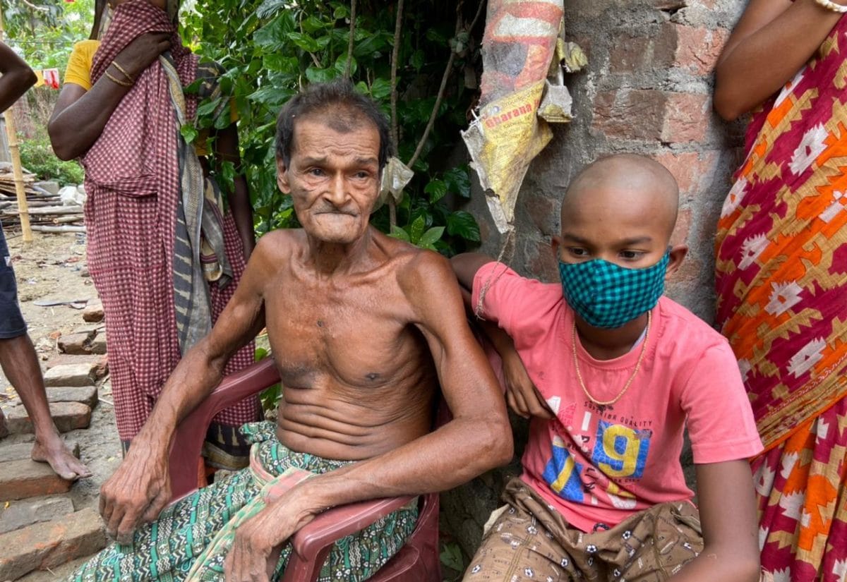 Haran Adhikari’s 70-year-old father Nakul Adhikari and 14-year-old son Deep Adhikari | Photo: Madhuparna Das/ThePrint