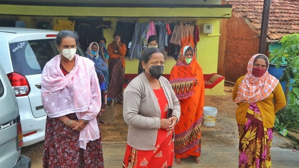 The family of Somashekhar outside their home at Brahma Devanahalli village | Photo: Praveen Jain/ThePrint