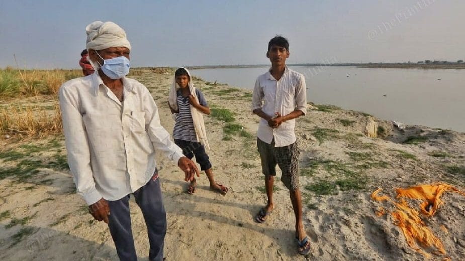 Vasudev (left) and Rishi Kumar at the banks of the Ganga in Unnao | Photo: Praveen Jain/ThePrint
