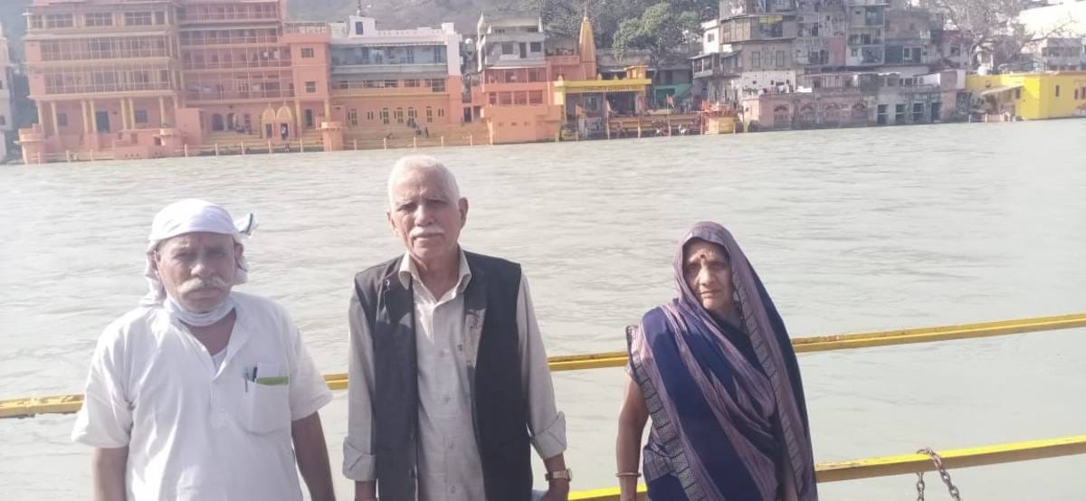 Bhogiram Raghuvanshi (left), with his wife and brother, Govind (centre), at the Kumbh Mela | Photo by special arrangement